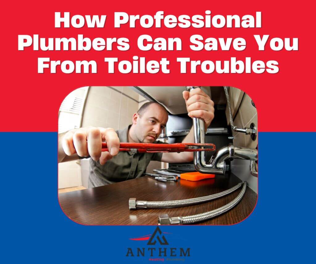  A professional plumber repairing a toilet with tools in a modern bathroom.